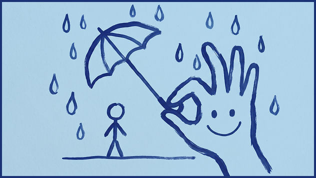 A hand holding an umbrella over a person in the rain